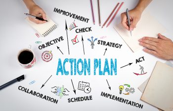 Action Plan Concept. The meeting at the white office table.